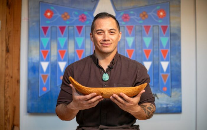 tapuwae roa executive director Te Pūoho Katene holding te waka